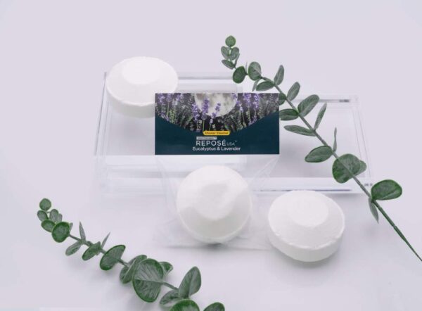 three white Shower Steamers in a pack