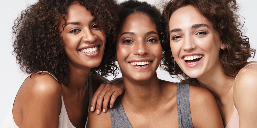 three women smiling