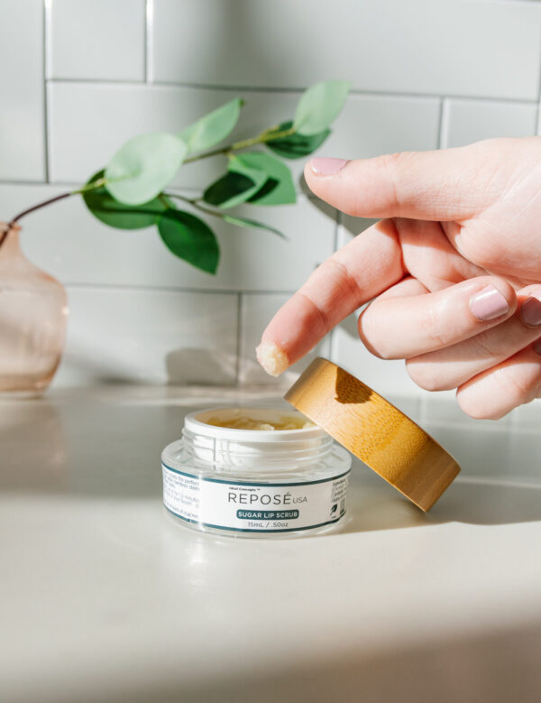 sugar scrub for lips and human hand